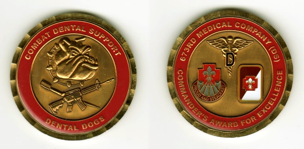 Round shaped, brushed coppery brass colored coin, 1 11/16  inches in diameter.