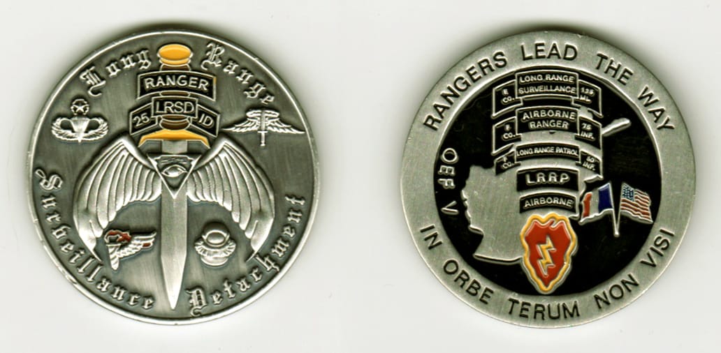 Round shaped, pewter colored coin, 1 11/16  inches in diameter.