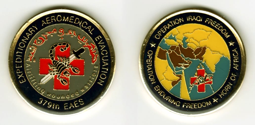 Round shaped, pewter colored coin, 1 11/16  inches in diameter.