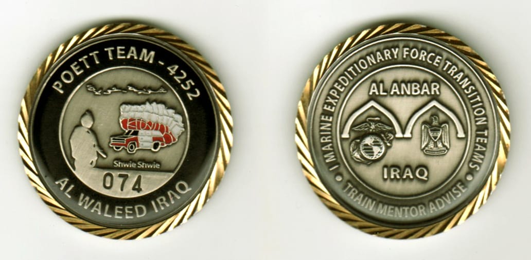 Round shaped, pewter colored coin, with a brass colored rim, 1 1/2  inches in diameter.