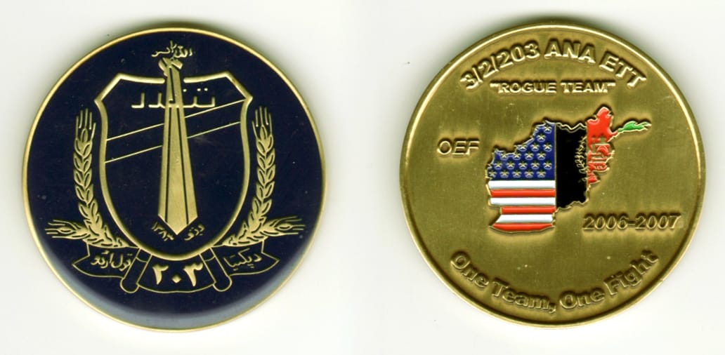 Round shaped, brass colored coin, 2  inches in diameter.