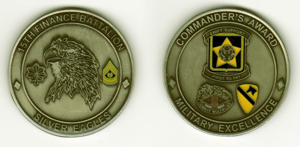 Round shaped, pewter colored coin, 2  inches in diameter.