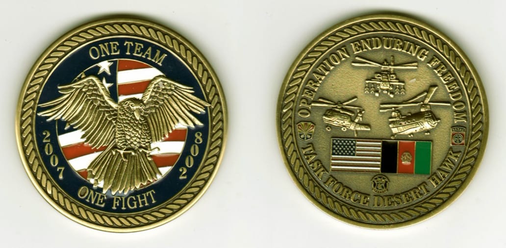 Round shaped, brass colored coin, 2  inches in diameter.