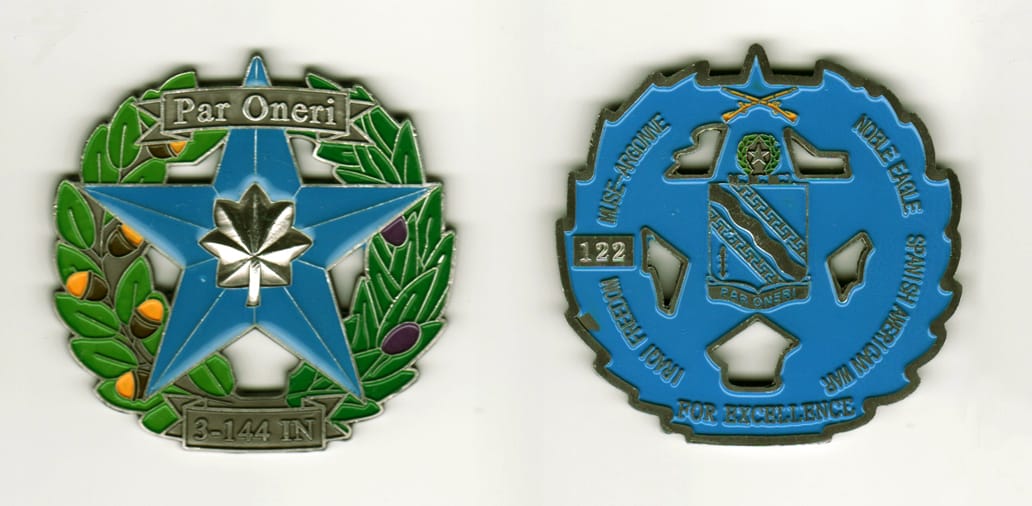 Round shaped , pewter colored coin,with cut out areas in center. 2 1/2 inches in diameter.