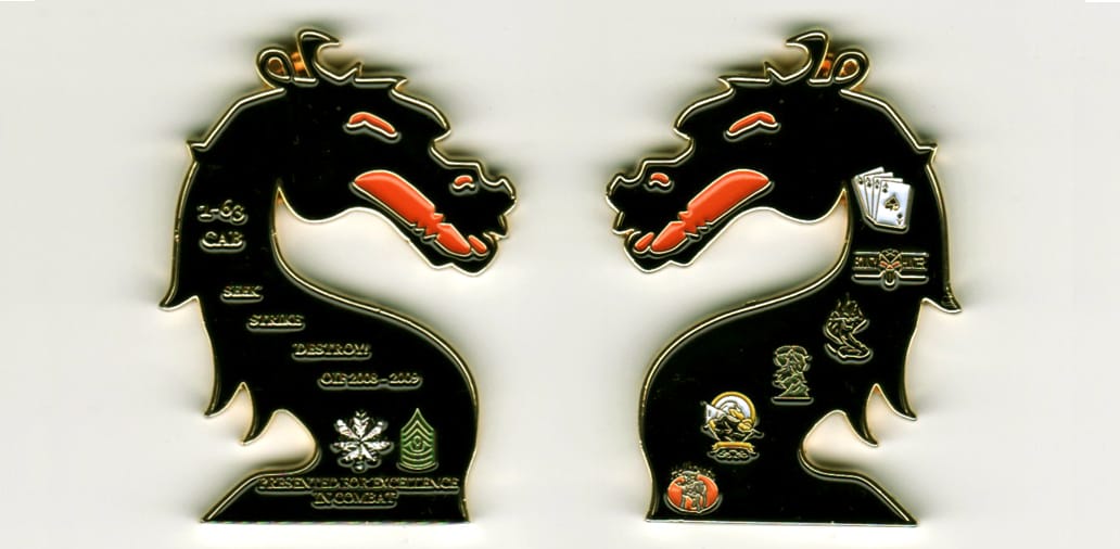 Dragon Head shaped, gold colored coin, 2 inches high x 1 1/2 inches wide