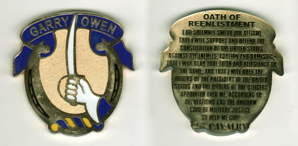 Horseshoe shaped with banner mounted above, gold colored coin, 2 1/2  inches high x 2 1/2  inches wide