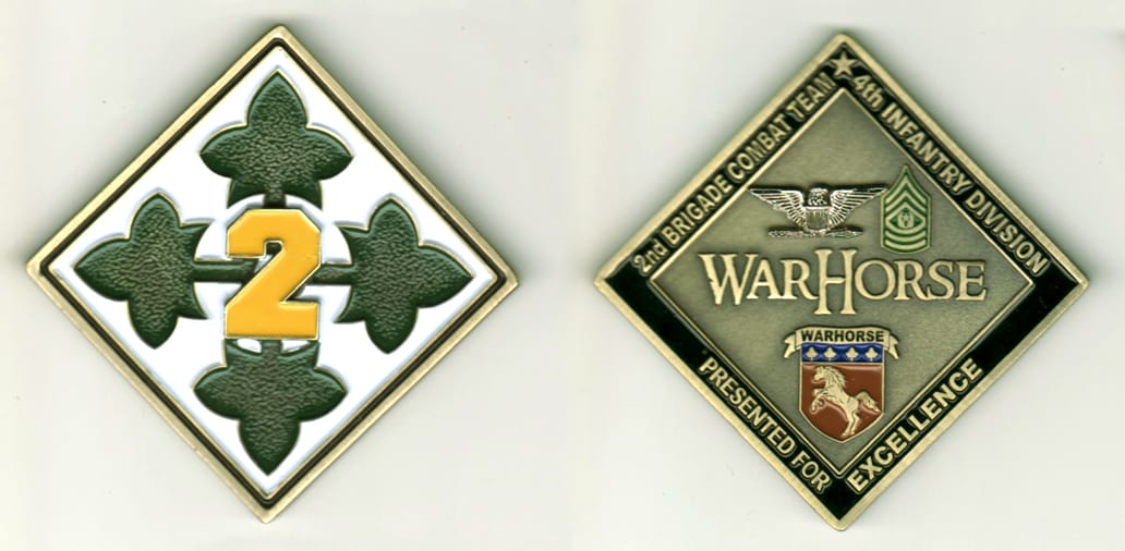 Diamond shaped, brass colored coin, 2 1/2  inches high x 2 1/2  inches wide