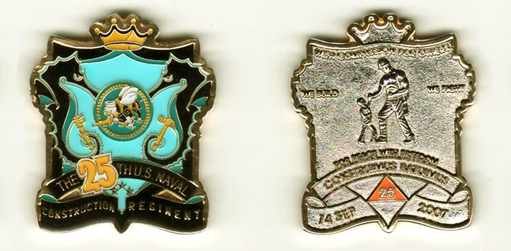 Shield shaped with a crown mounted above, gold colored coin, 1 1/2 inches high x 1 1/2 inches wide