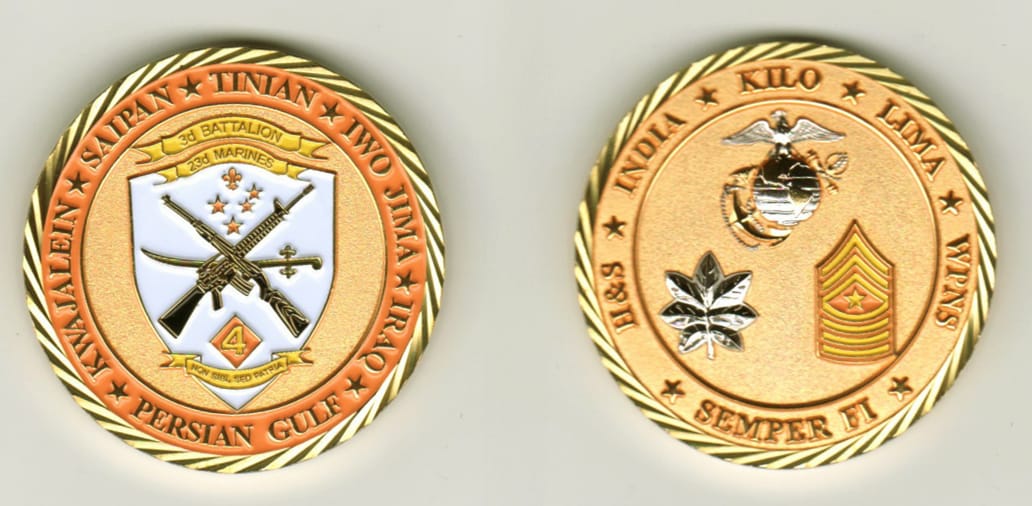 Round shaped, gold colored coin, 1 9/16 inches in diameter.