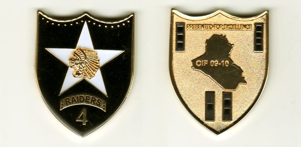 Shield  shaped, gold colored coin, 1 3/4 inches high x 1 1/2  inches wide