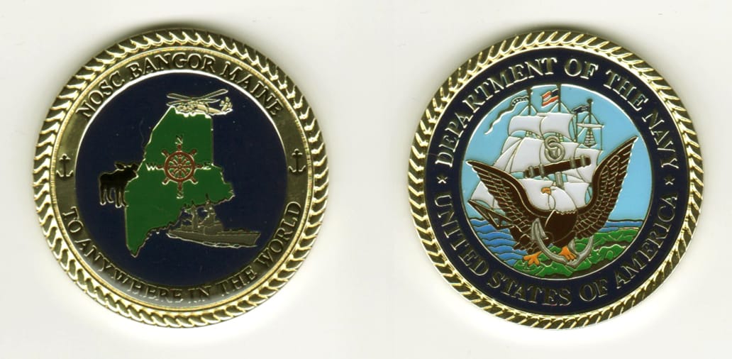 Round shaped, gold colored coin, 1-5/8 inches in diameter.