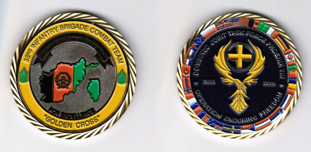 Round shaped, silver colored coin, 2 1/8 inches in diameter.