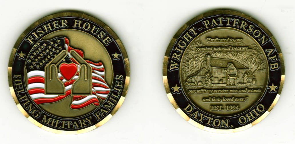 Round shaped, brass colored coin, 2  inches in diameter.