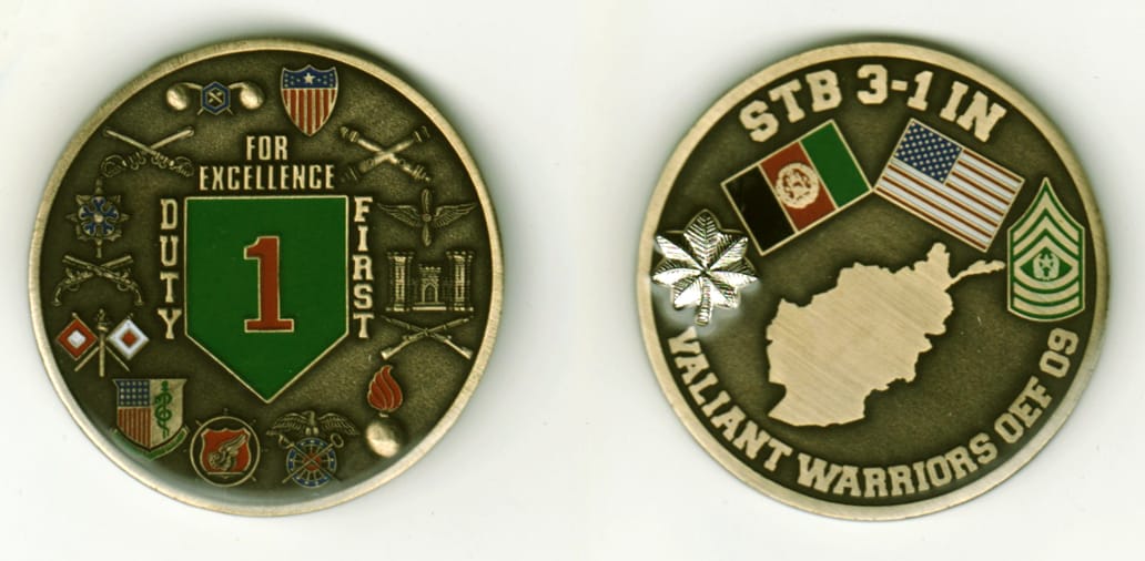 Round shaped, brass colored coin, 2  inches in diameter.