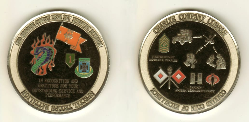 Round shaped, silver colored coin, 2  1/8 inches in diameter.