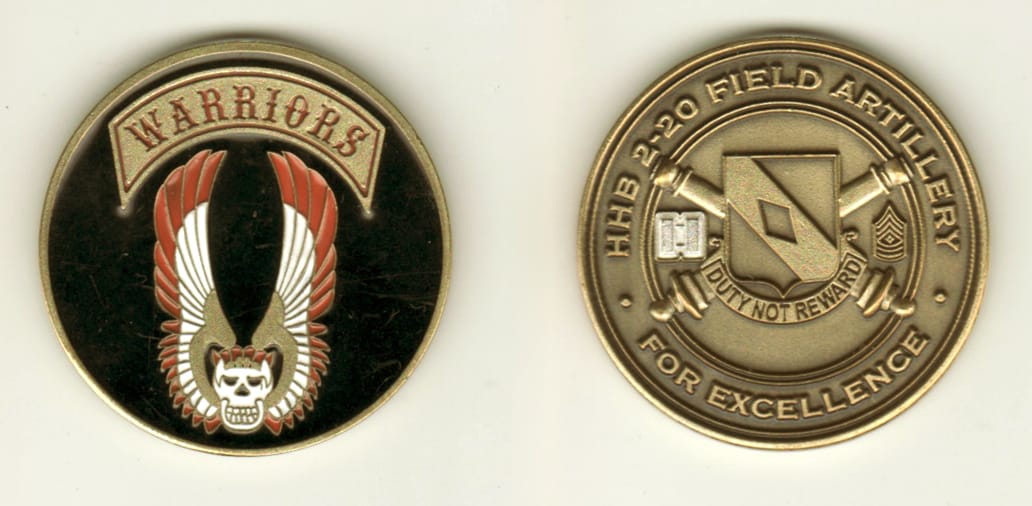 Round shaped, brass colored coin, 1 11/16 inches in diameter.