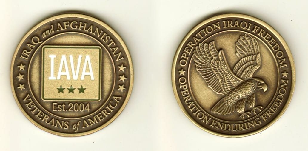 Round shaped, brass colored coin, 1 11/16 inches in diameter.