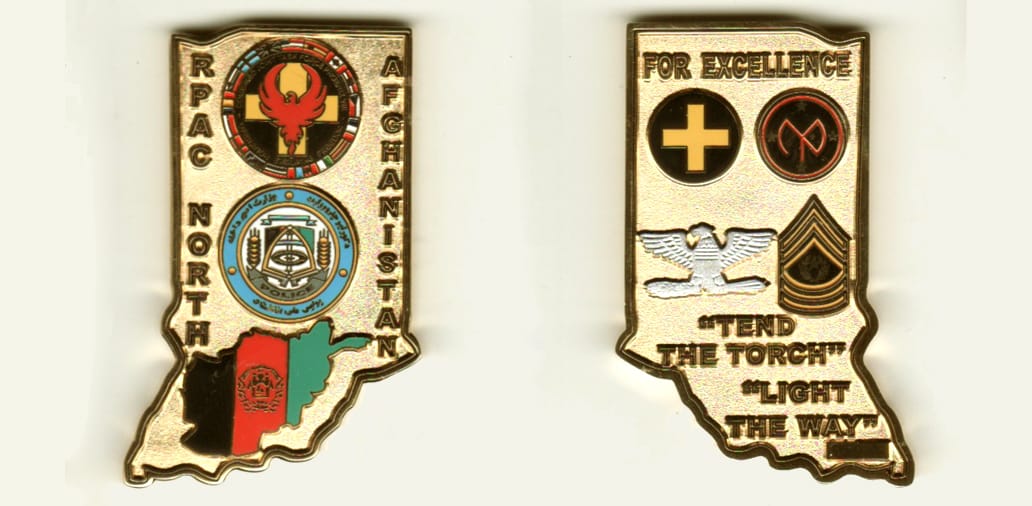 Gold colored coin, 2 inches high x 1 inch wide.