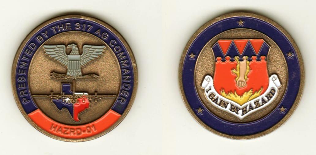 Round shaped, brass colored coin, 1 1/2 inches in diameter.