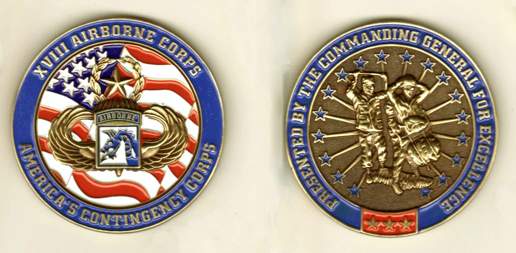 Round shaped, brass colored coin, 2 3/16 inches in diameter.