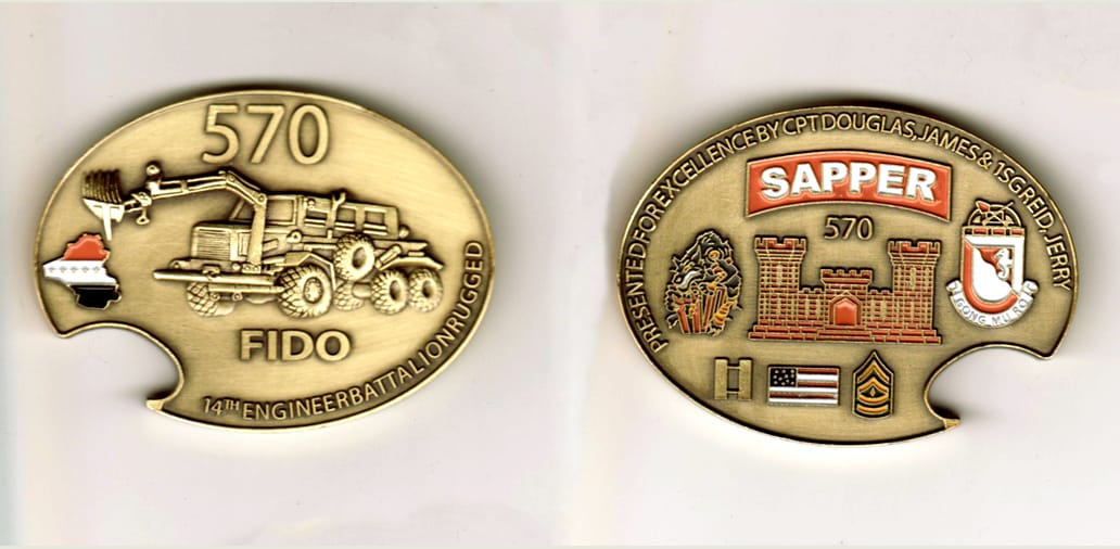 Oval shaped, brass colored coin, 2  inches high x 2 1/2 inches wide.