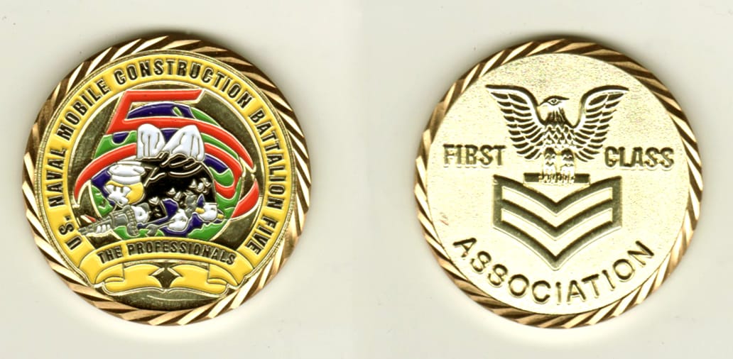 Round shaped, gold colored coin, 1-5/8 inches in diameter.