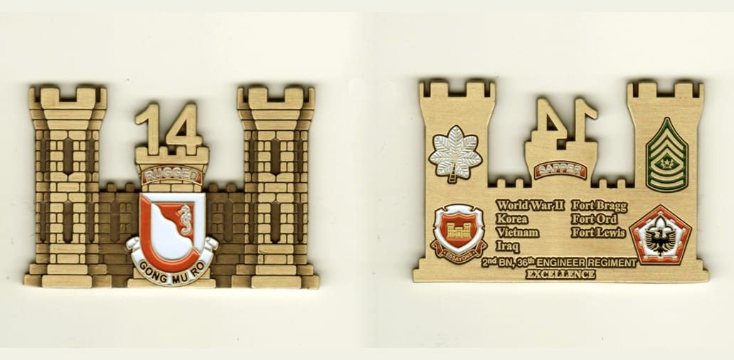 Engineer castle shaped, brass colored coin, 1 3/4 inches high x 2 1/2 inches wide.