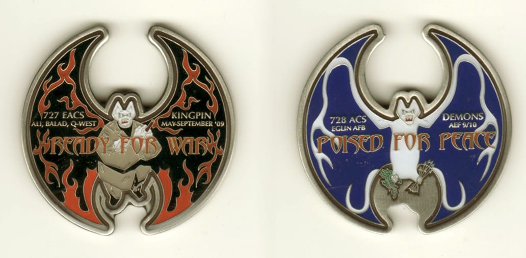 Round shaped with cut out areas on top and bottom, pewter colored coin, 2 inches in diameter.