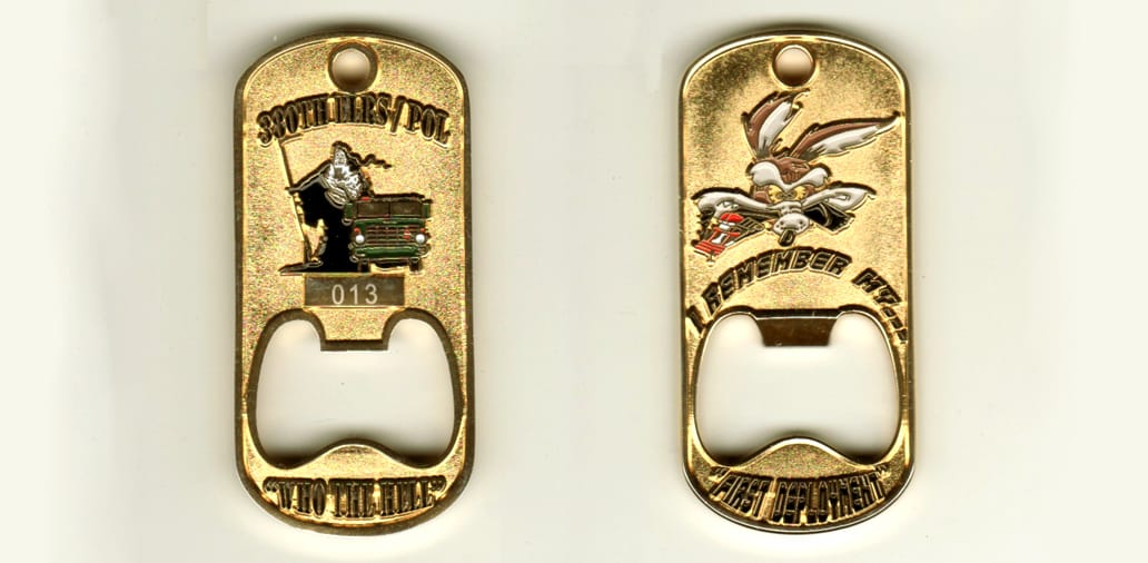 Dog Tag shaped with cut out bottle opener area, gold colored coin, 2 1/4 inches high x 1 2/16 inches wide.