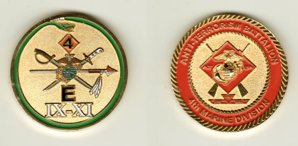 Round shaped, gold colored coin, 1 1/2 inches in diameter.