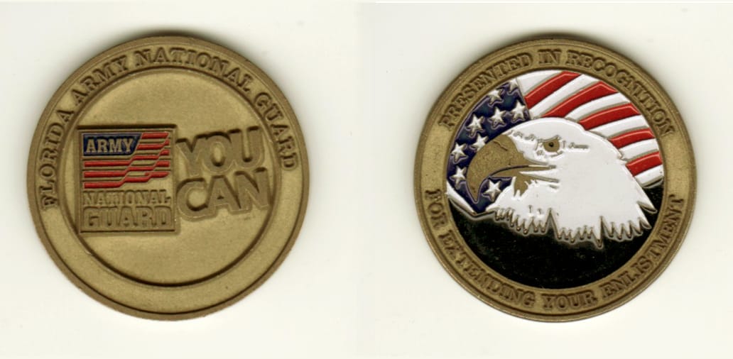 Round shaped, brass colored coin, 1 1/2 inches in diameter.