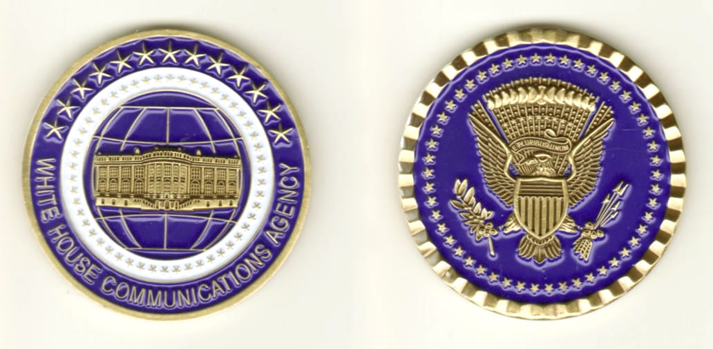 Round brass, gold colored coin, 1 11/16 inches in diameter.