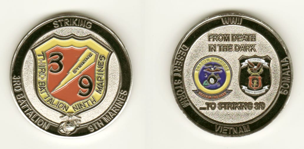 Round shaped, silver colored coin, 1 11/16 inches in diameter.