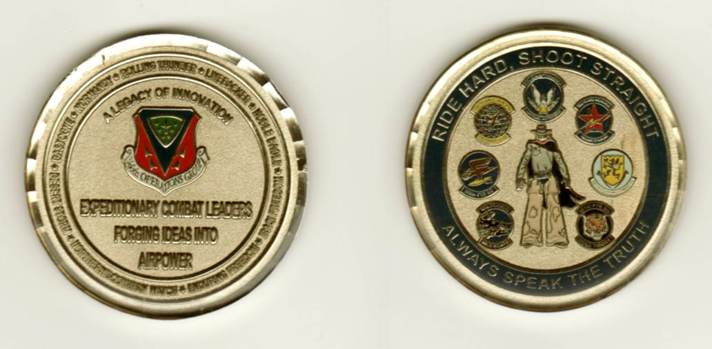 Round shaped, silver colored coin, 1 11/16 inches in diameter.