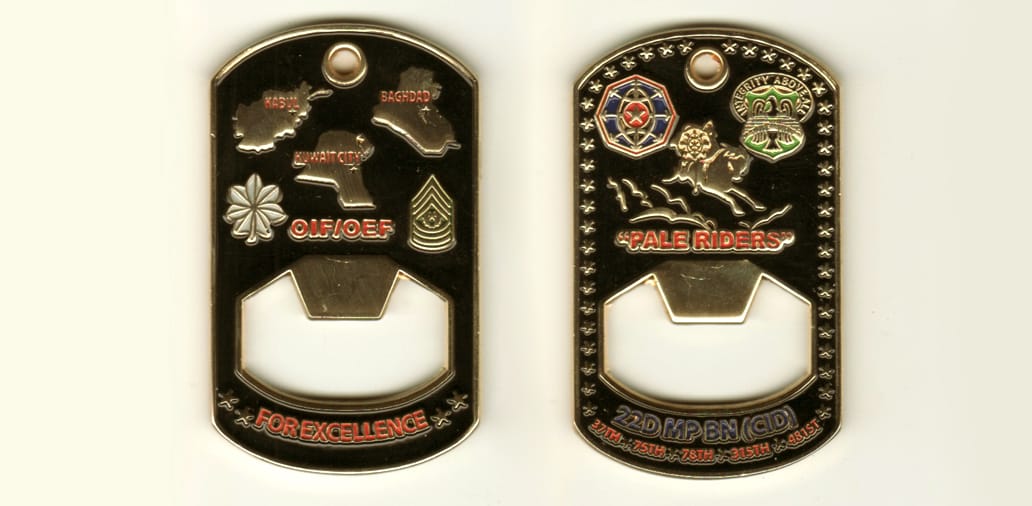 Dog Tag shaped with cut out bottle opener area, gold colored coin, 2 1/4 inches high x 1 1/2 inches wide.