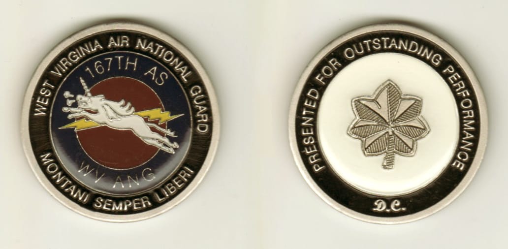 Round shaped, pewter colored coin, 1-5/8 inches in diameter.