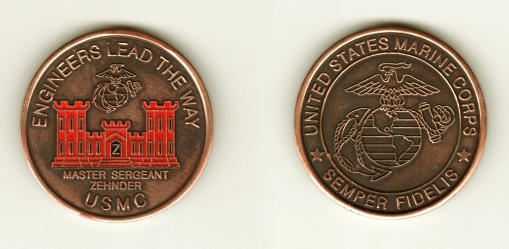 Round shaped, copper colored coin, 1-5/8 inches in diameter.