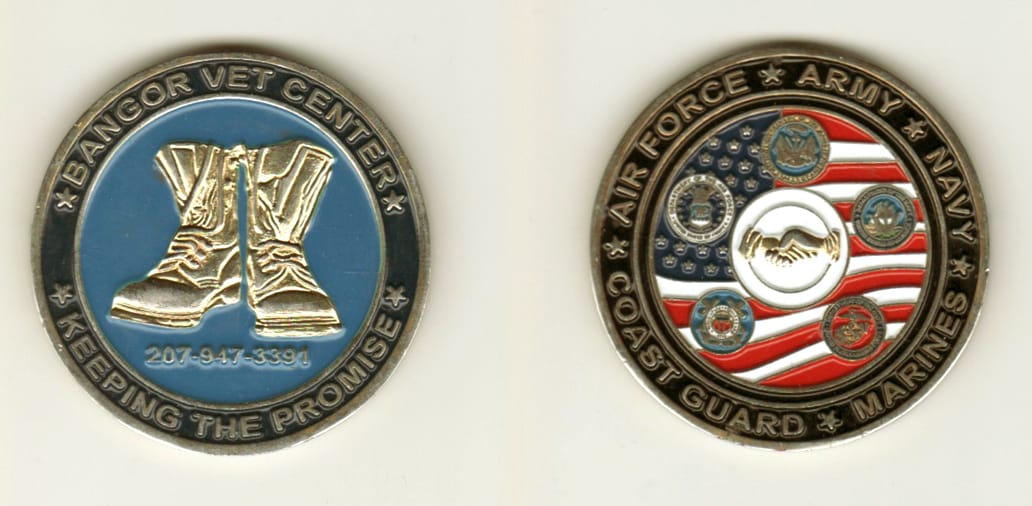 Round shaped, brass colored coin, 1 9/16 inches in diameter.