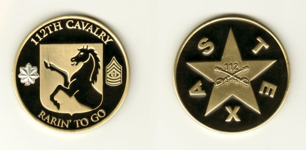 Round shaped, brass colored coin, 1 11/16 inches in diameter.