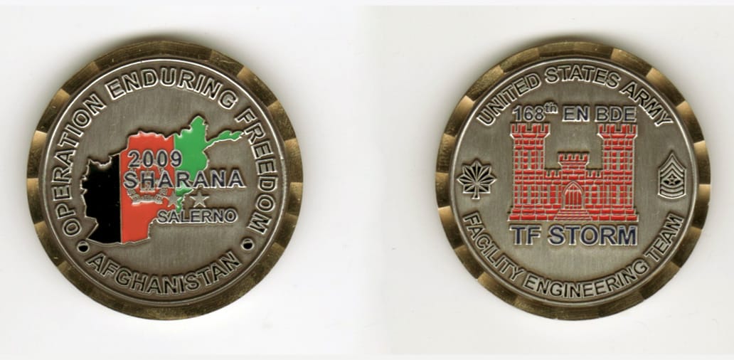 Round shaped, brass colored coin, 1 13/16 inches in diameter.