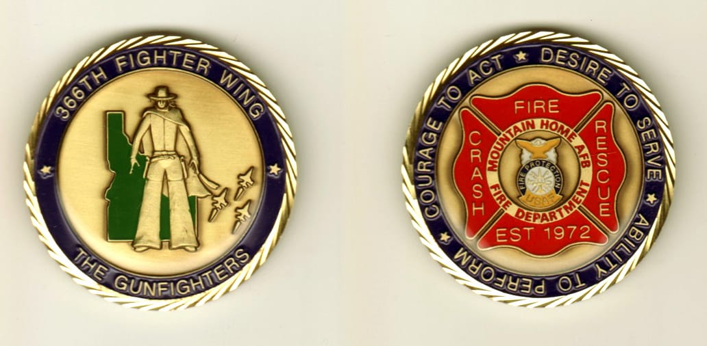 Round shaped, brass colored coin, 1 11/16 inches in diameter.