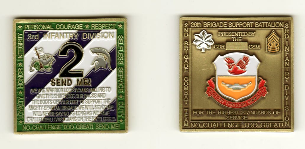 Square shaped, brass colored coin, 2 inches high x 2 inches wide.