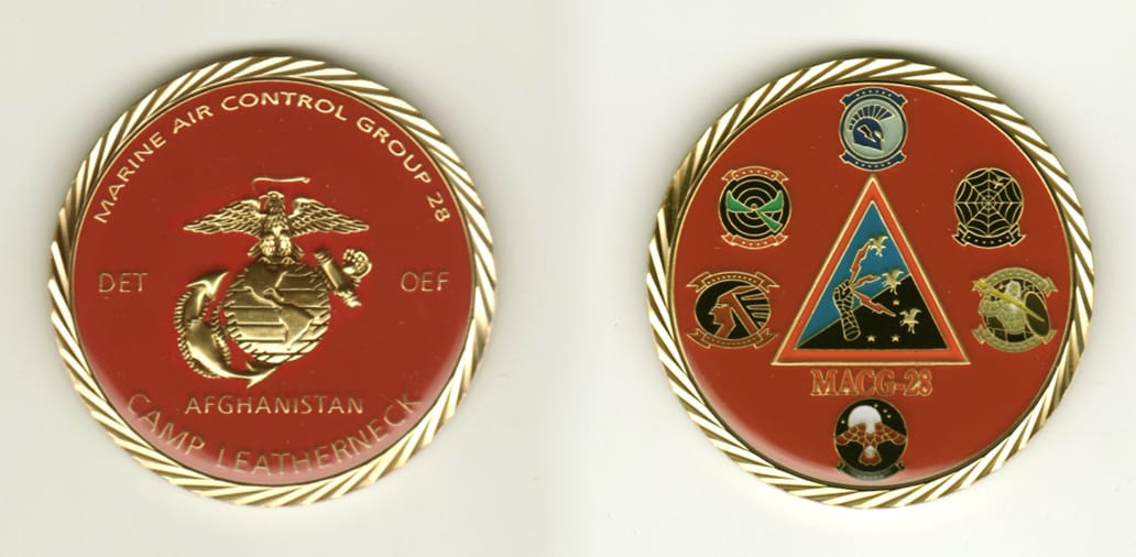 Round shaped, brass colored coin, 2 1/8 inches in diameter.