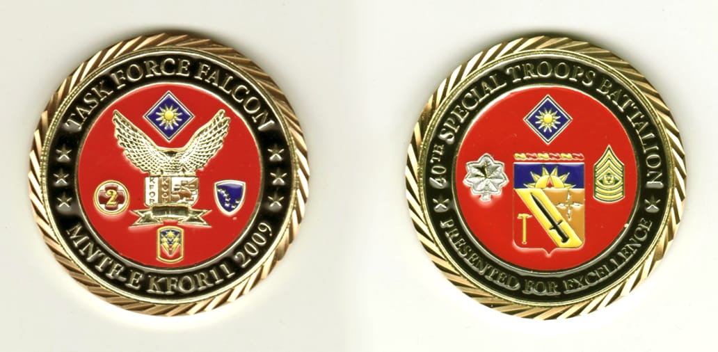 Round shaped, gold colored coin, 2 1/8 inches in diameter.