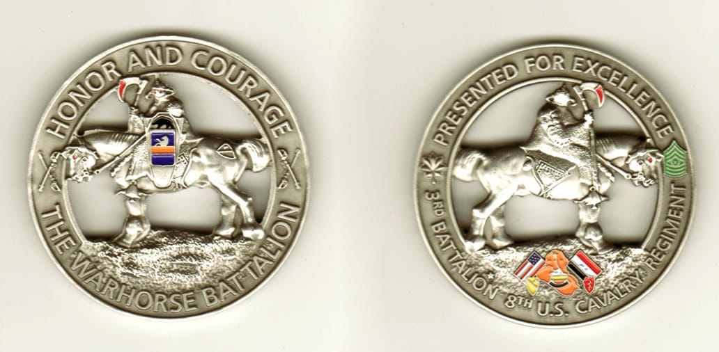 Round shaped, pewter colored coin, 2 1/8 inches in diameter.