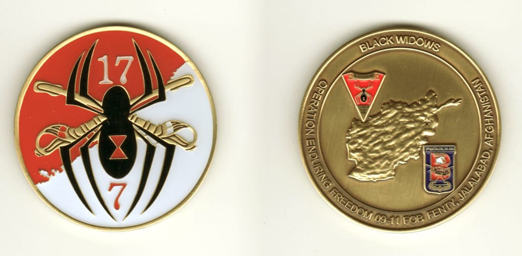 Round shaped, brass colored coin, 2 1/8 inches in diameter.