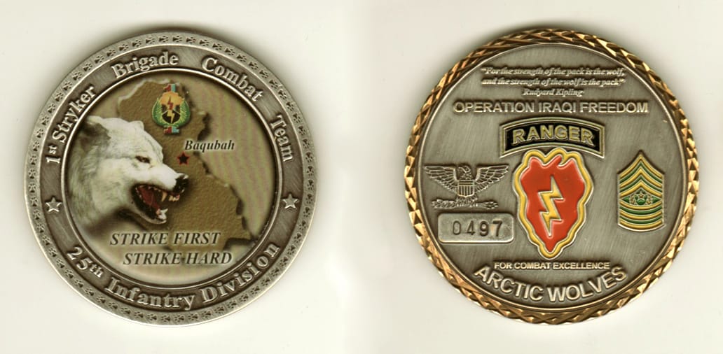 Round shaped, pewter  colored coin, 2 1/8 inches in diameter.