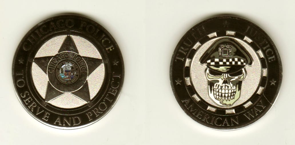 Round shaped, silver colored coin, 1 1/4 inches in diameter.