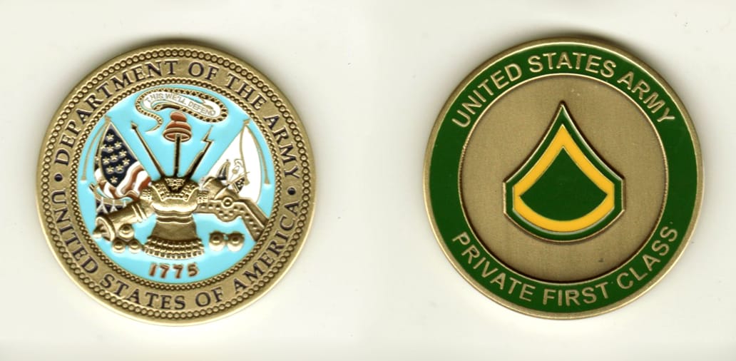 Round shaped, brass colored coin, 1 1/2 inches in diameter.