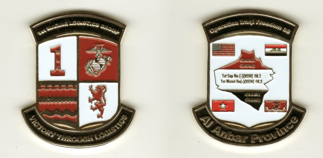 Shield shaped, with banner mounted above and below, gold colored coin, 1 1/2 inches wide x 2 inches high.